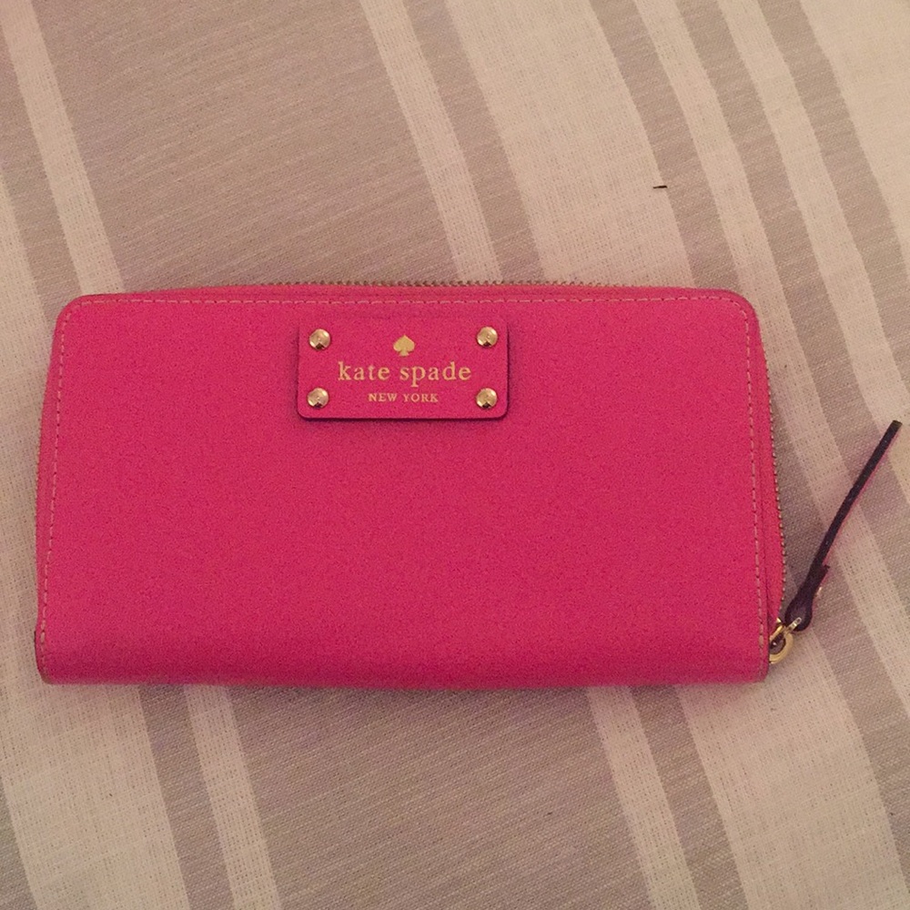Kate spade pink wallet.